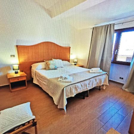 Le Camere Sul Porto Palau Bagian luar foto